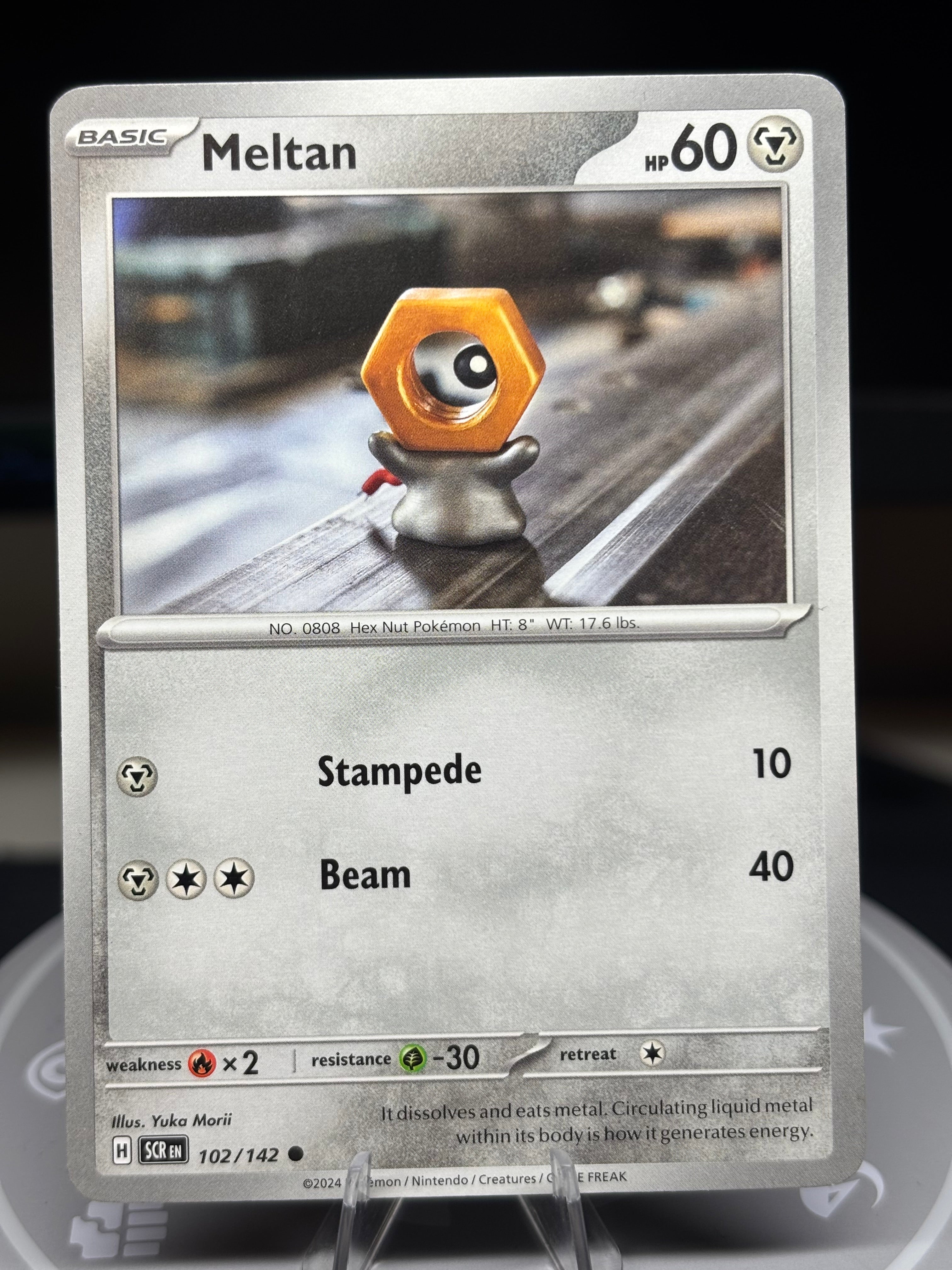 Meltan 102 / 142 - Stellar Crown